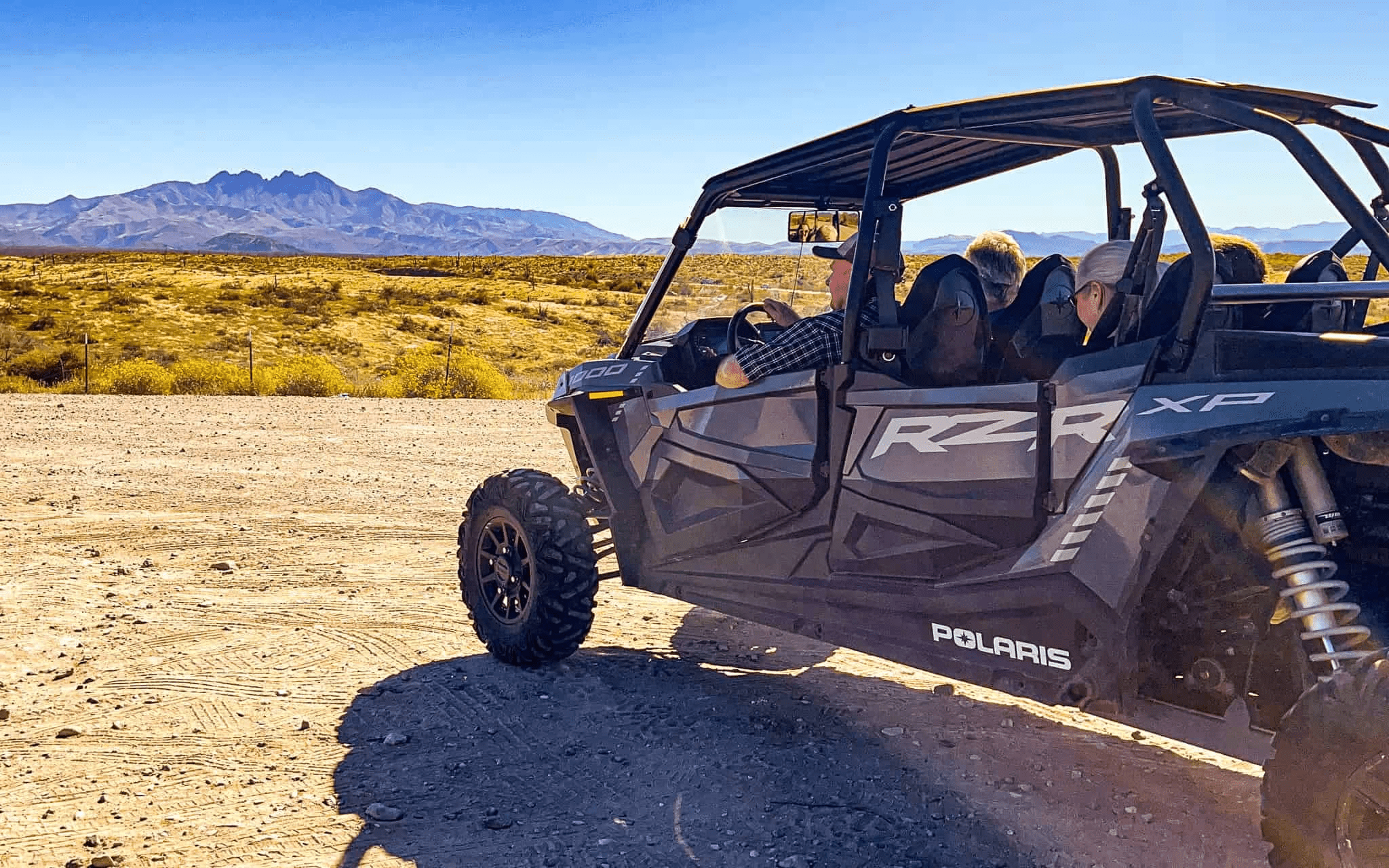 Adventure club ATV in a desert.