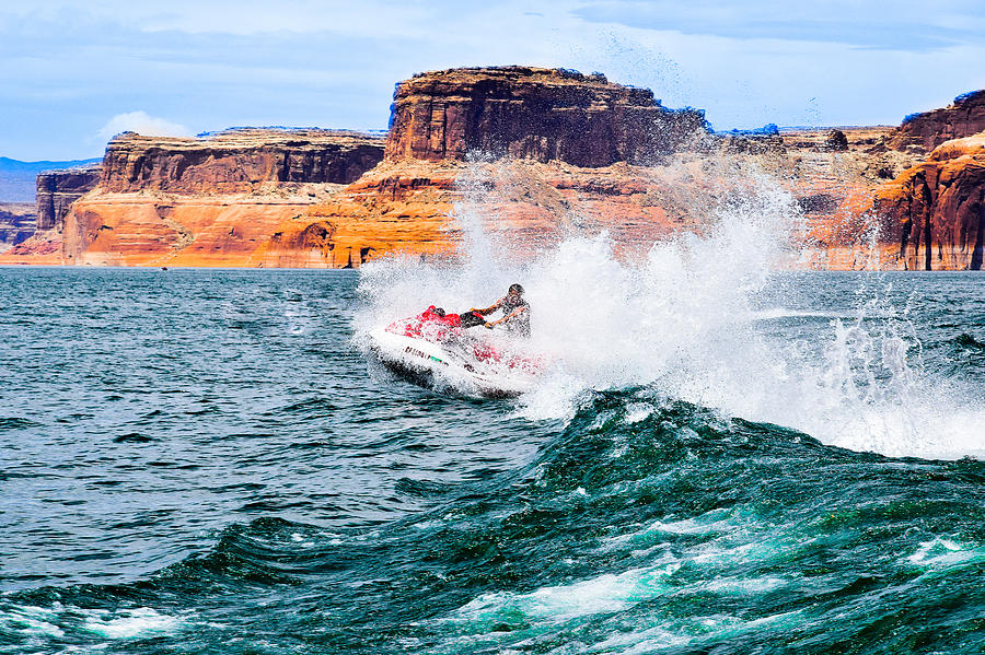 A person enjoying a jet ski in the water.