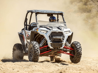 Adventure Club a gentleman is enjoying driving an ATV
